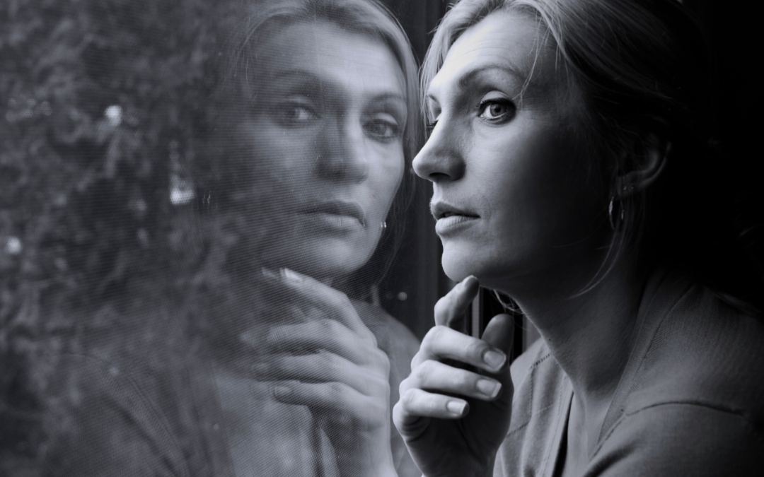 Woman reflecting on her life after healing from an emotionally abusive relationship